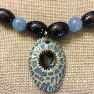 Handmade statement necklace. Porcelain pendant.